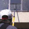 Alumiglass® Telescopic Extension Poles cleaning windows.