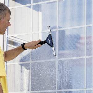 ProDesign squeegee cleaning a large picture window