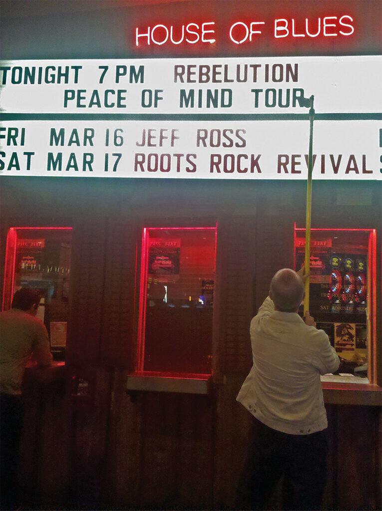 Pro-Pole Fiberglass and a single cup letter changer changing letters on a marquee at the House of Blues In Las Vegas.