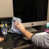 Dusting electronics with a microfiber cleaning cloth