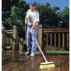 Stiff flow-thru brush scrubbing a deck