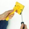 Removing the pad from the Trim Smart paint edger using a screwdriver