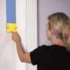 Painting against trim with the trim smart edger