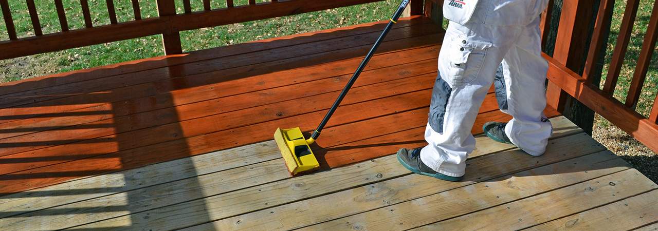 Staining a deck with the 12 inch premium deck stain applicator.