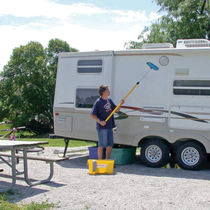 Truck 'n Bus extension pole cleaning an RV