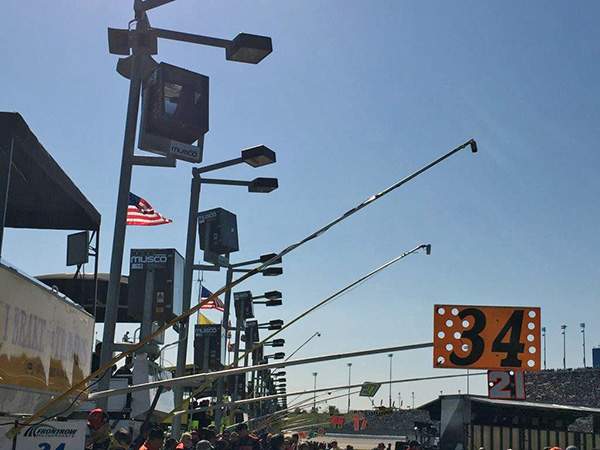 Uses for extension poles during a race include; cameras, mics, pit stop signaling and more.