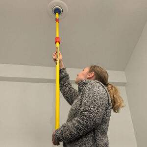 Complete light bulb changer kit changing a recessed spot light