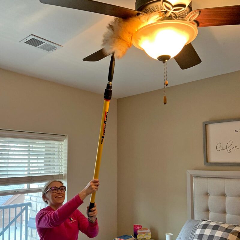 Dusting a ceiling fan with Alumiglass 3-6 ft extension pole.