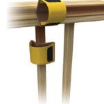Illustration of Contour Stain Applicator staining spindles and railings.