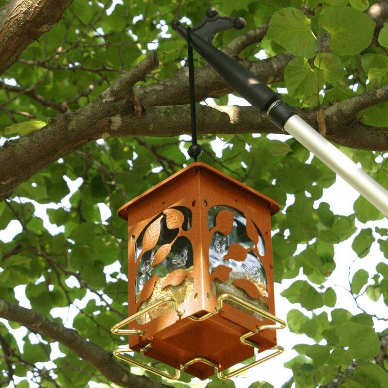 Hanging a bird feeder with a hook.